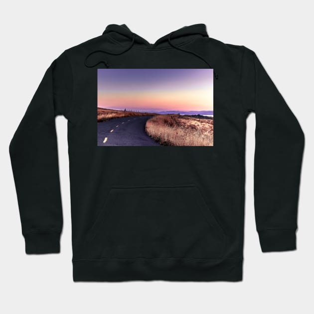 A road leading to foggy sunrise Hoodie by blossomcophoto